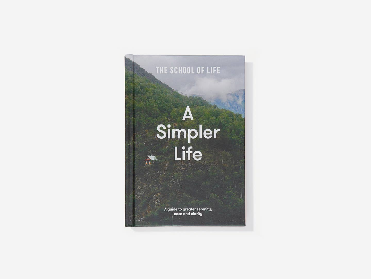 Book titled 'A Simpler Life' by The School of Life on a white background