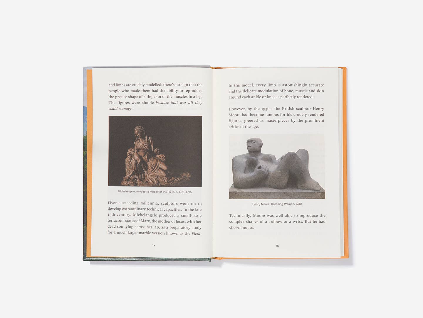 Open book with text and images of sculptures on a white background