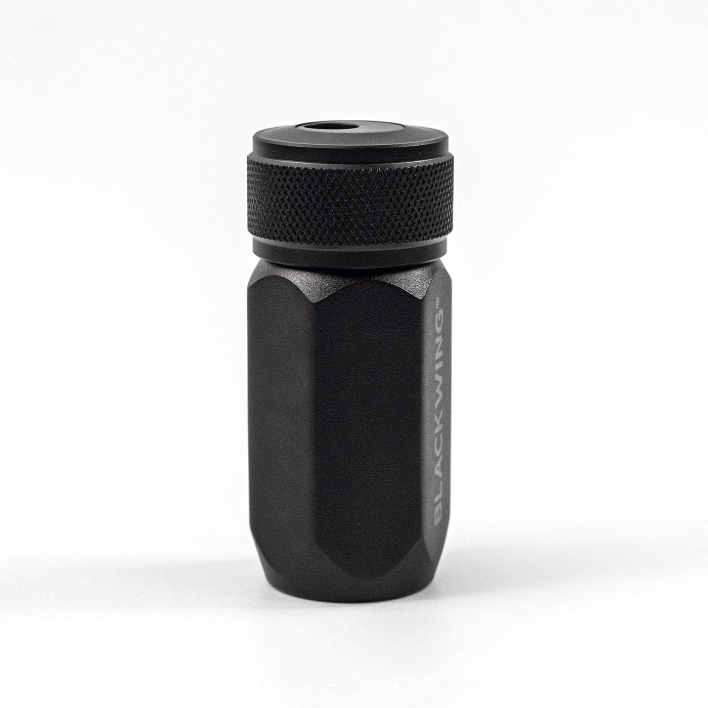 Black water bottle with textured cap on a white background