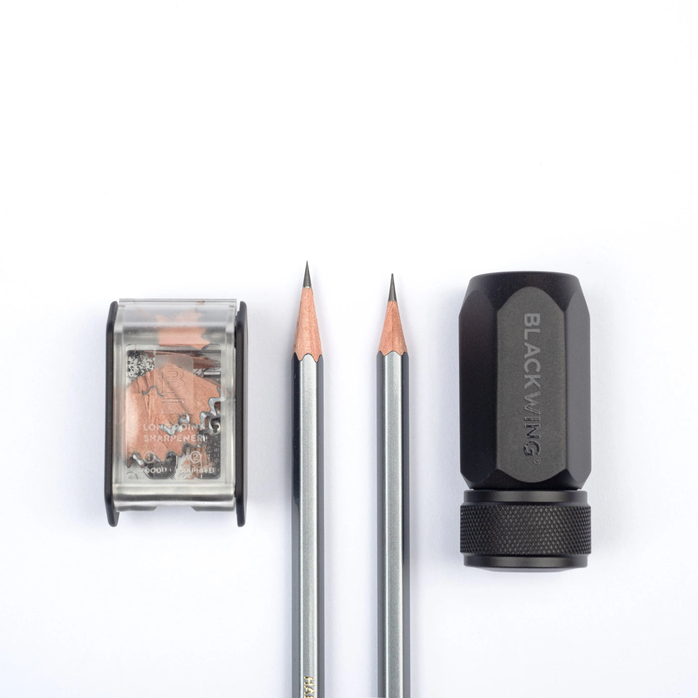 Blackwing pencils and sharpener on a white background