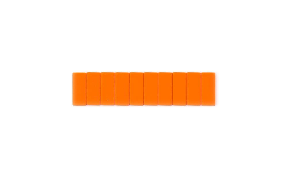 A row of eight bright orange rectangular blocks arranged horizontally on a plain white background.
