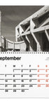 A single-page spiral calendar page showing the month of September. The top portion features a black-and-white architectural photograph with a tall tower and angular concrete structures.