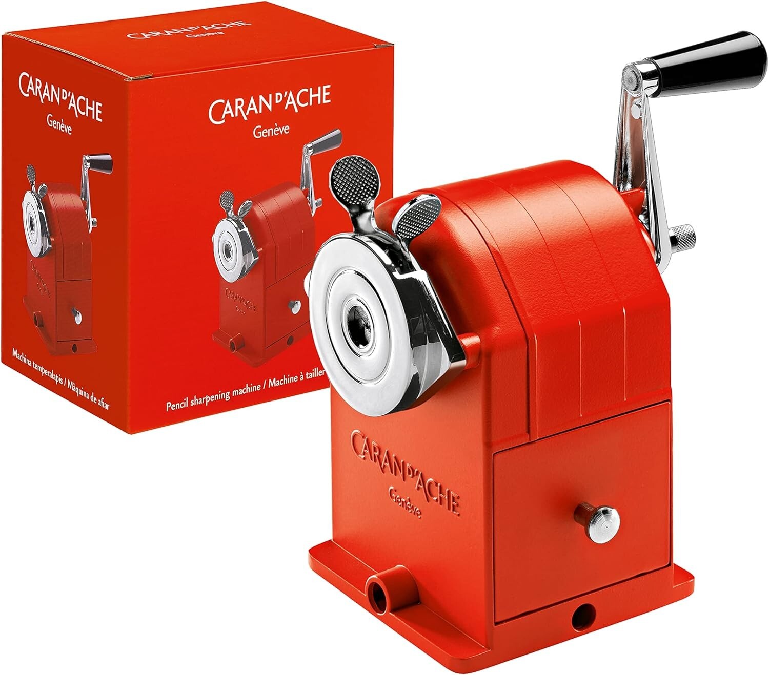 Red pencil sharpener with Caran d'Ache branding and packaging.