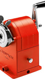 Red manual pencil sharpener with 'Caran d'Ache' branding on a white background