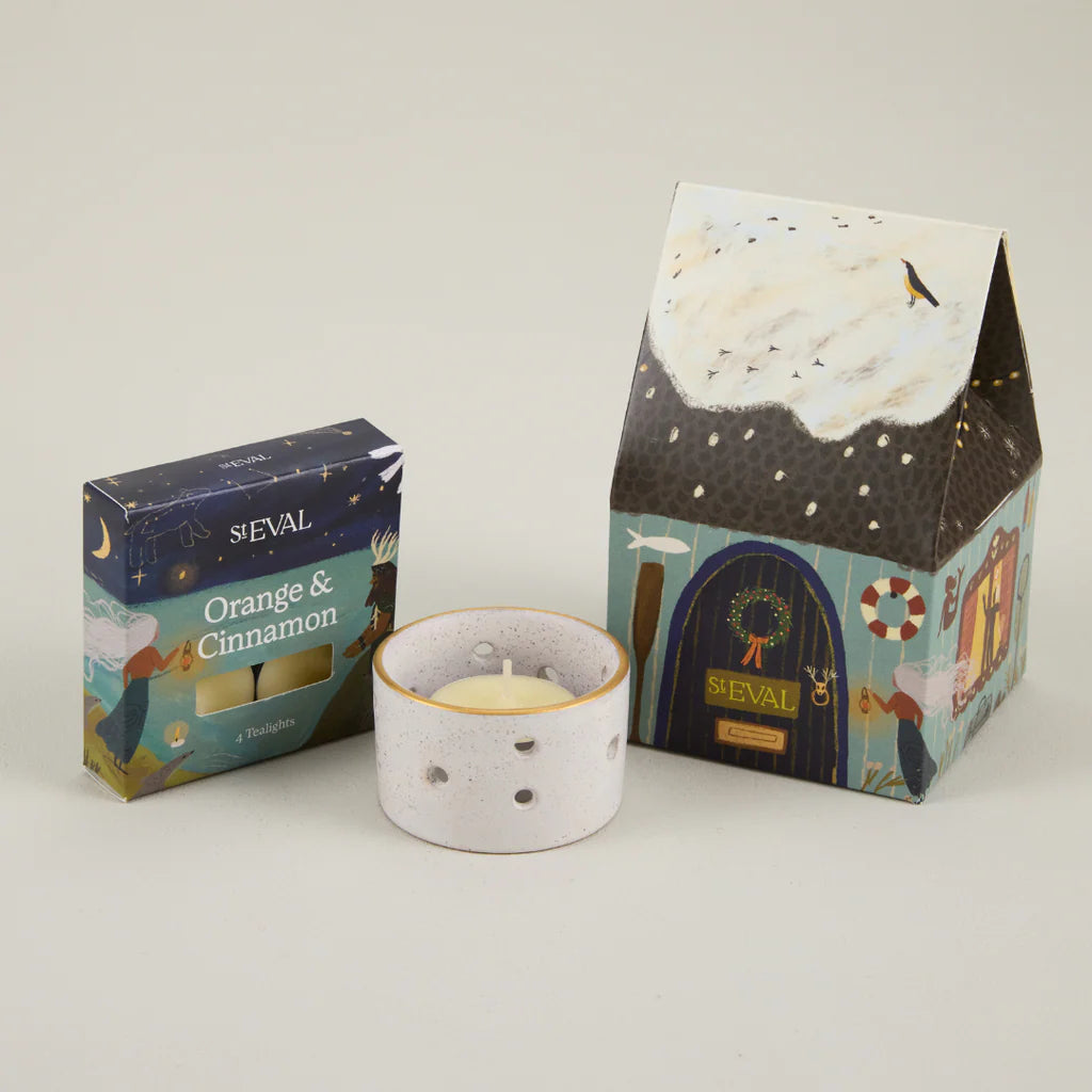 Sheval candle and packaging on a light gray background