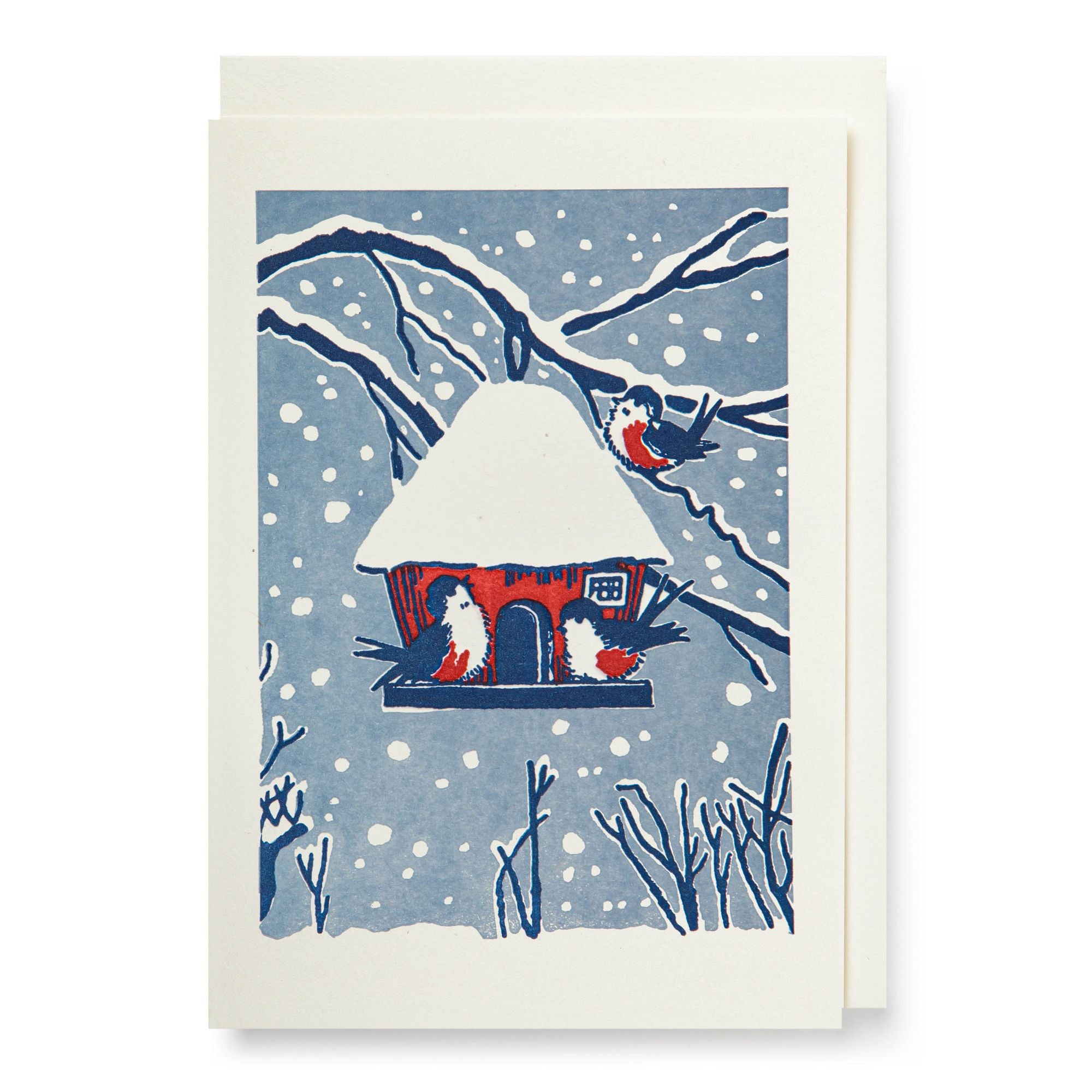 Greeting card with a winter scene featuring a snow-covered cabin and birds.