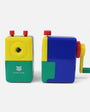 Two colorful pencil sharpeners on a white background