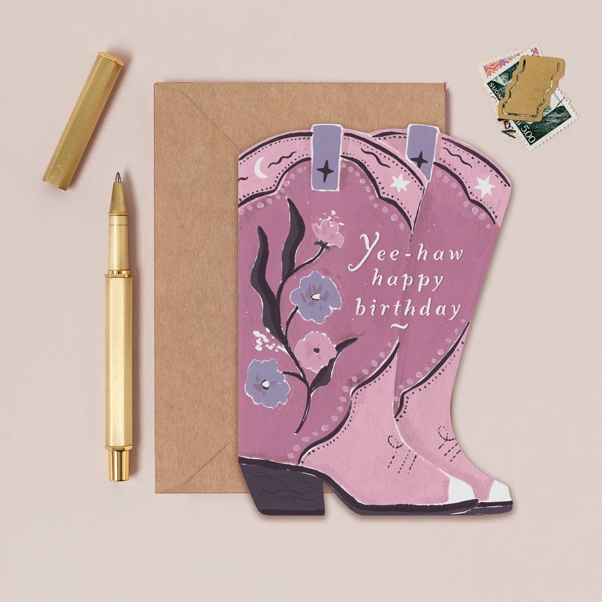 Pink cowboy boot card with 'Yee-haw happy birthday' text on a beige background
