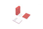 Red playing cards with grid design on a white background