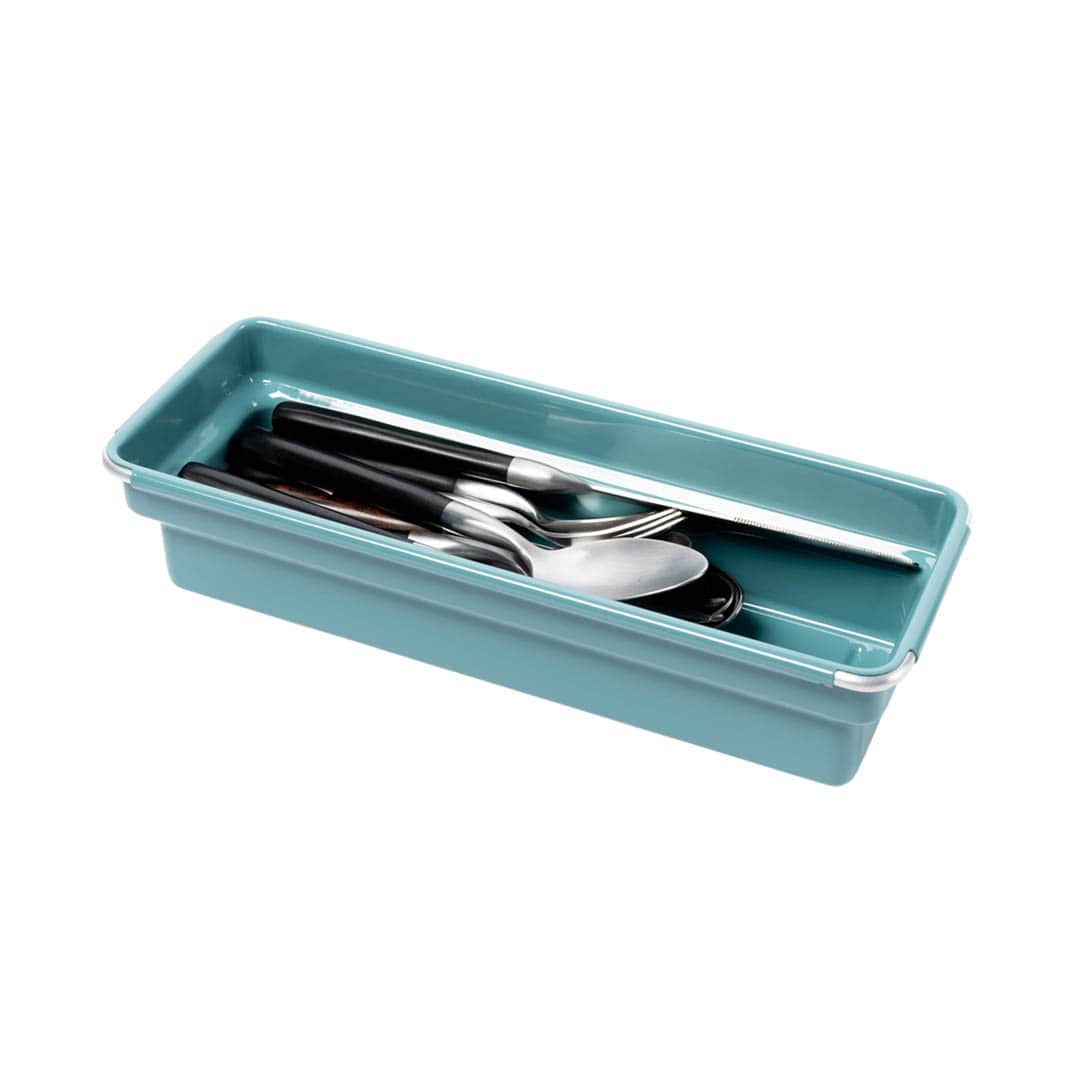 A rectangular teal plastic drawer organizer tray containing silver metal cutlery with black handles, set against a plain white background.
