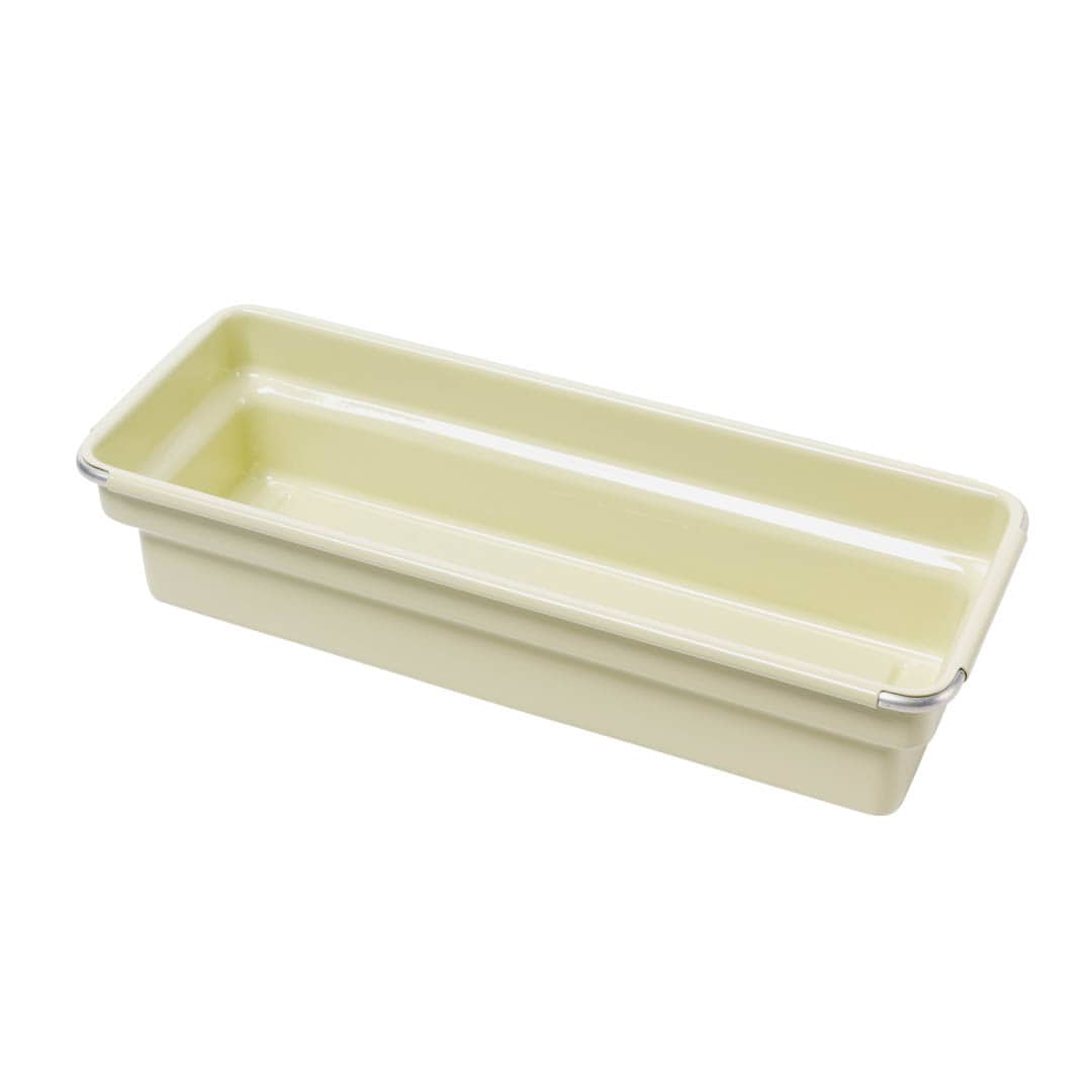 Rectangular ceramic dish with a silver rim on a white background