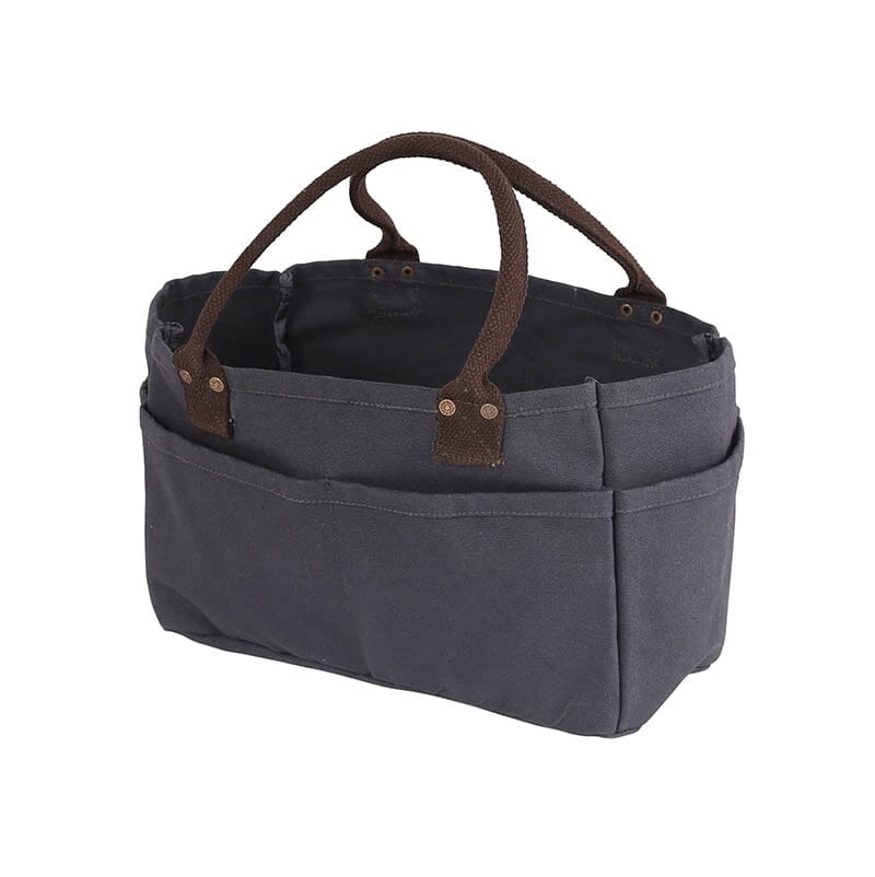 Gray tote bag with brown leather handles on a white background