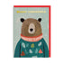 Christmas card with a bear illustration and 'BEARY CHRISTMAS' text on a light blue background.
