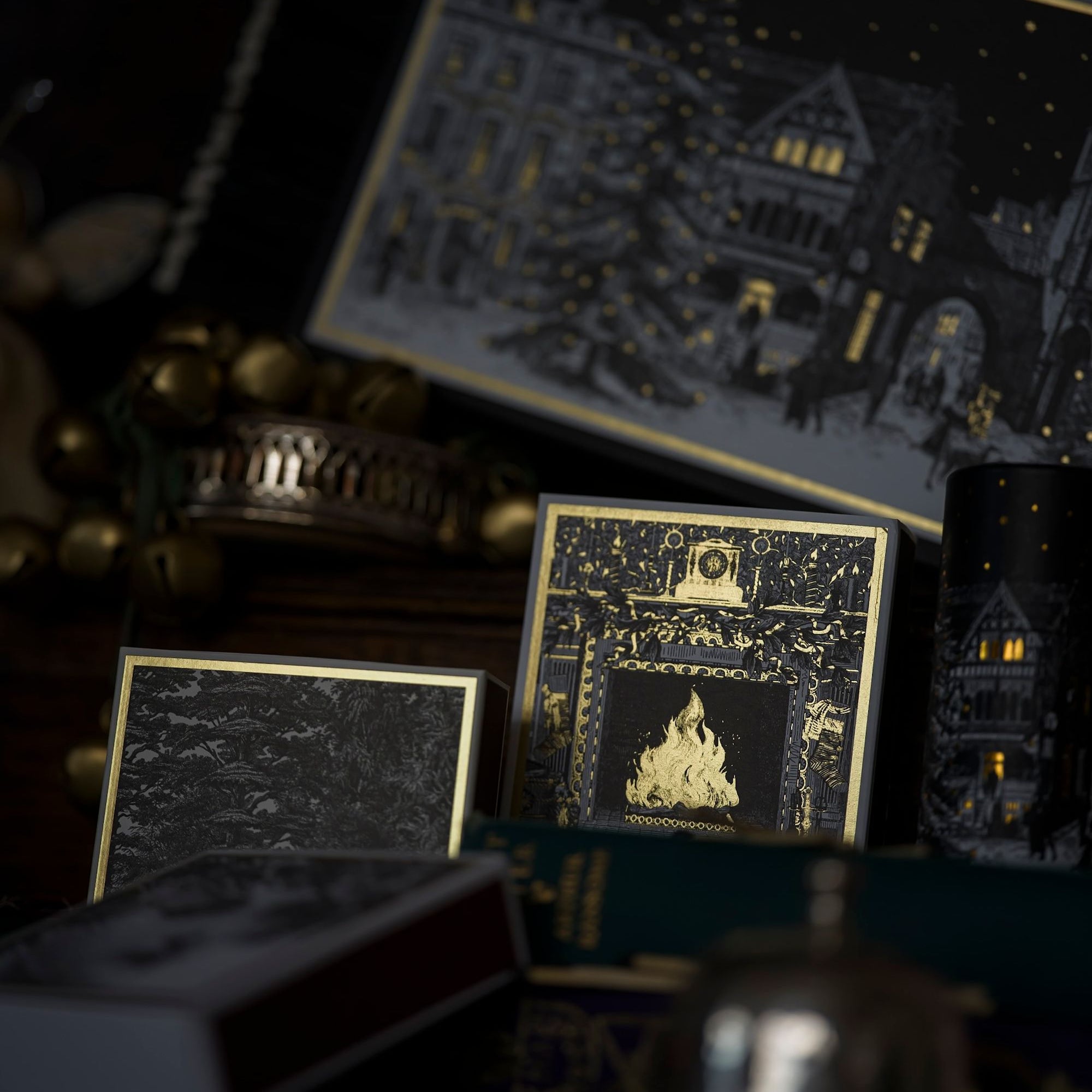 Decorative boxes with intricate designs on a dark background
