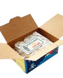 Open cardboard box with a plastic-wrapped item and 'Welcome to Japan' sign.