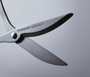 Close-up of a pair of scissors with Nakabayashi Stainless Steel branding on a gray background