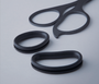 Black scissors on a light gray background