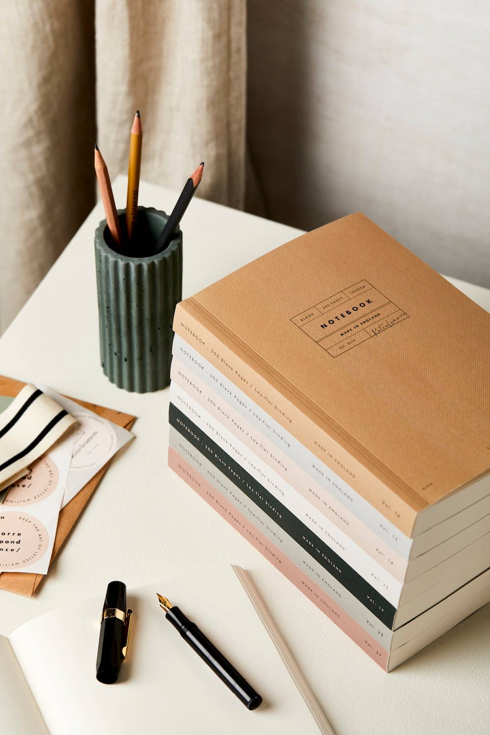 Katie Leamon stacked notebooks on desk 2