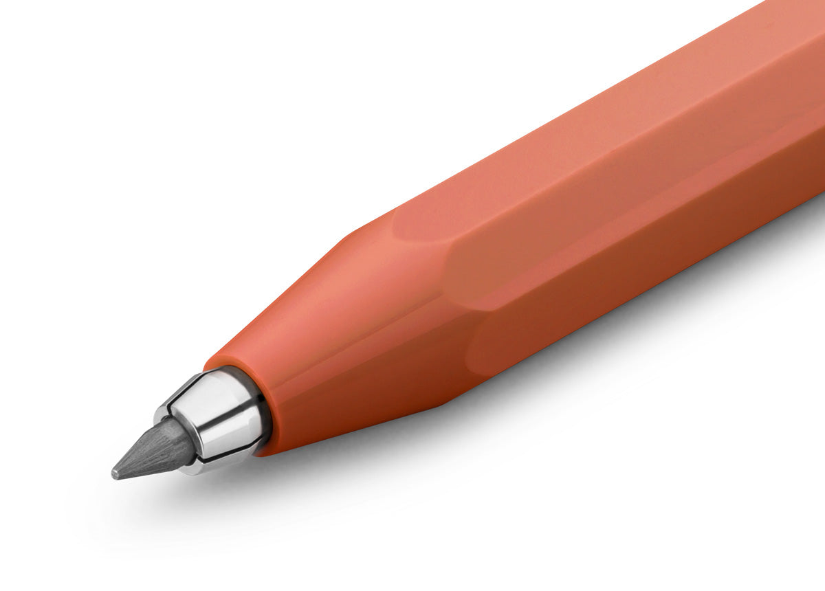 Red pencil with a silver cap on a white background
