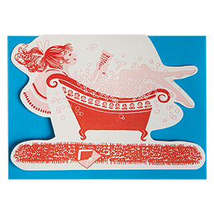 Decorative paper cutout of a bathtub with a red interior on a blue background