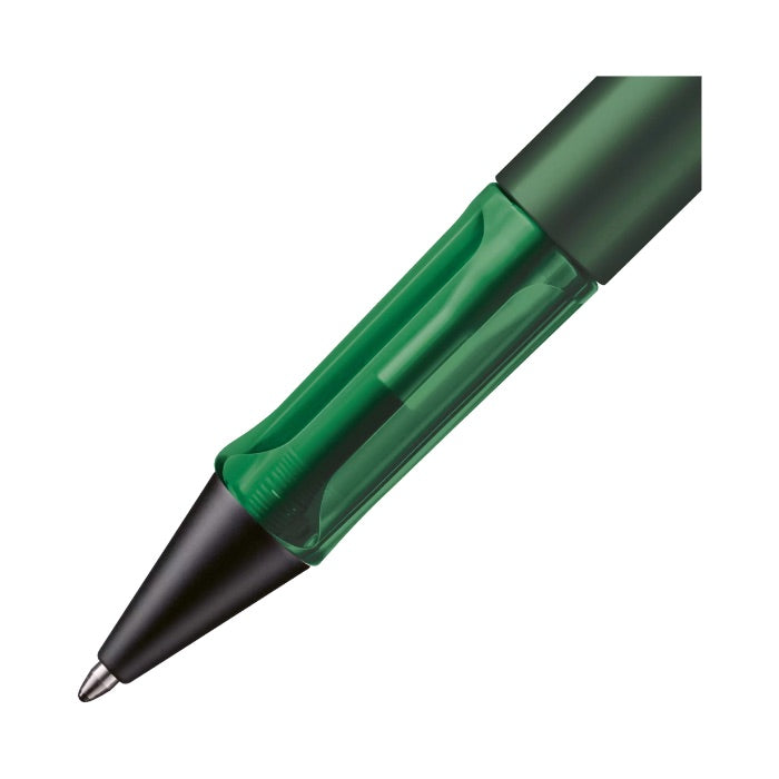 Green pen with black clip on a white background