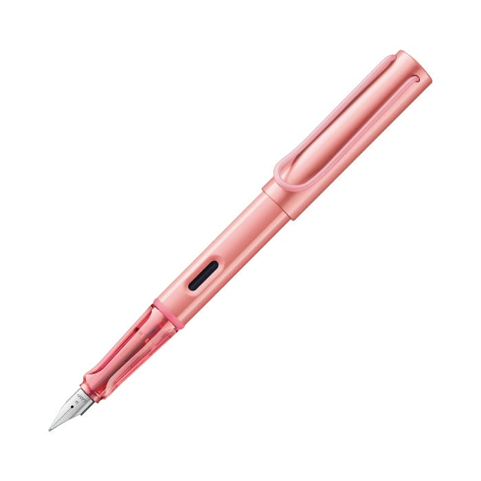 Pink fountain pen on a white background