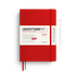 A red Leuchtturm1917 2027 daily planner with a white paper band around the middle, shown closed with a red ribbon bookmark. A white pen is pictured to the right as an included accessory on a clean white background.