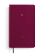 Maroon notebook with '2027' printed on it, on a white background
