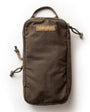 A brown and yellow venture pouch with elastic loops and pockets, alongside a pair of shoes and a bag, suggesting it can be carried in a bag or used as a crossbody bag.