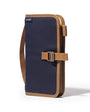 Navy blue and brown bag with a strap on a white background