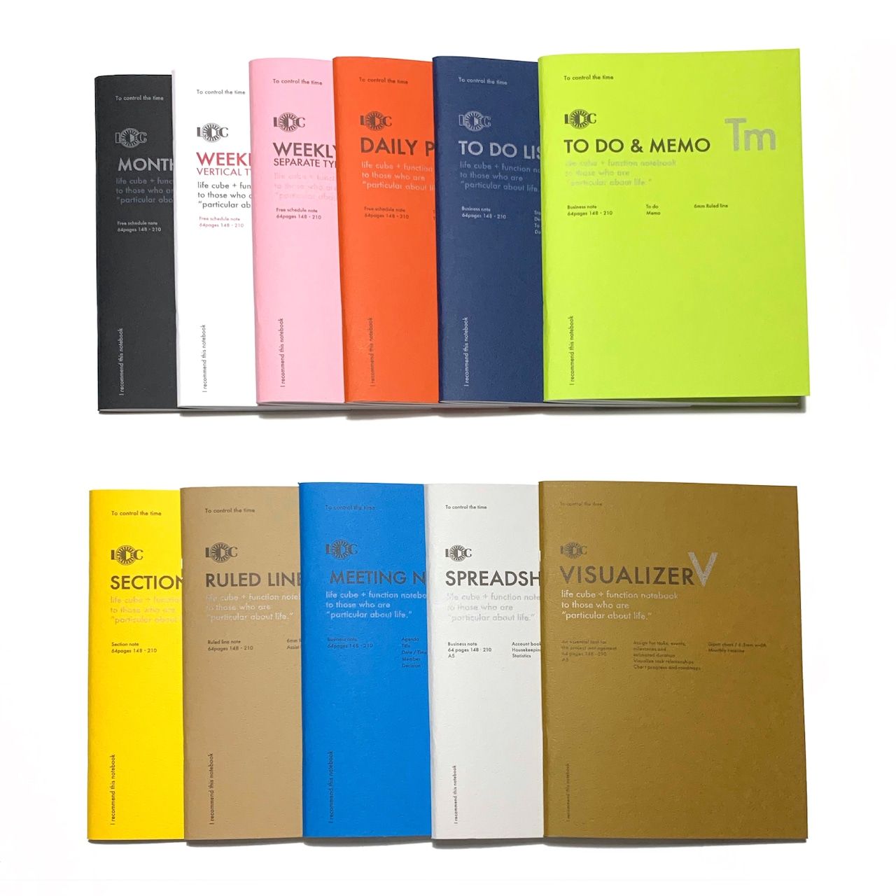 Set of colorful notebooks with various designs on a white background