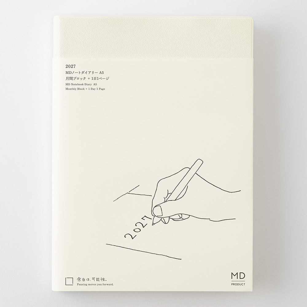 An off-white planner or diary cover with minimalist black line art showing a hand writing '2027'. Small black text appears in the upper left, and 'MD PRODUCT' is printed in the lower right.