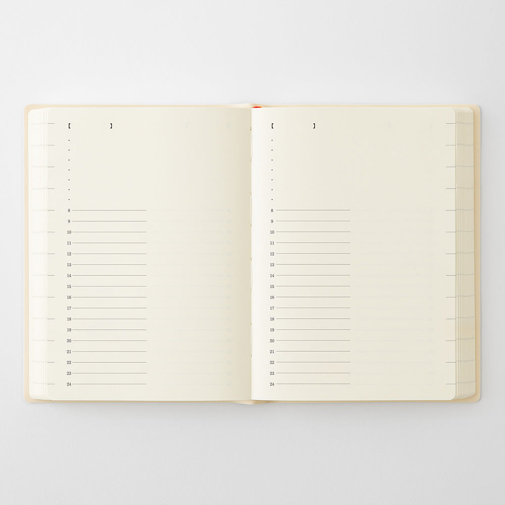 An open cream-colored planner or notebook with lined pages and bracket headers, photographed flat against a light gray background.