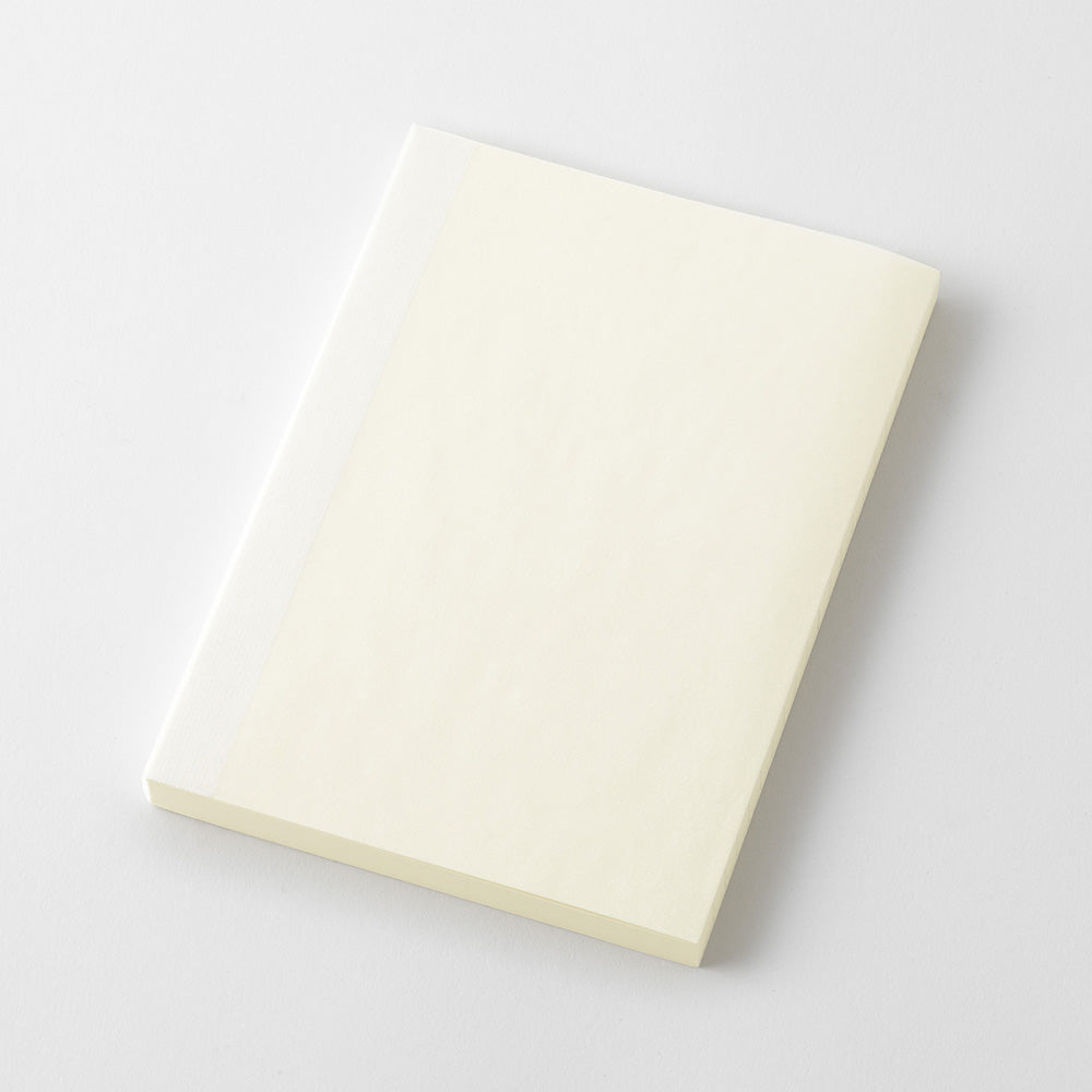 Plain white notebook on a light gray background