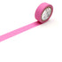 Roll of matte pink tape with a white label on a white background