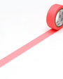 Roll of shocking red tape on a white background