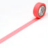 Roll of shocking red tape on a white background