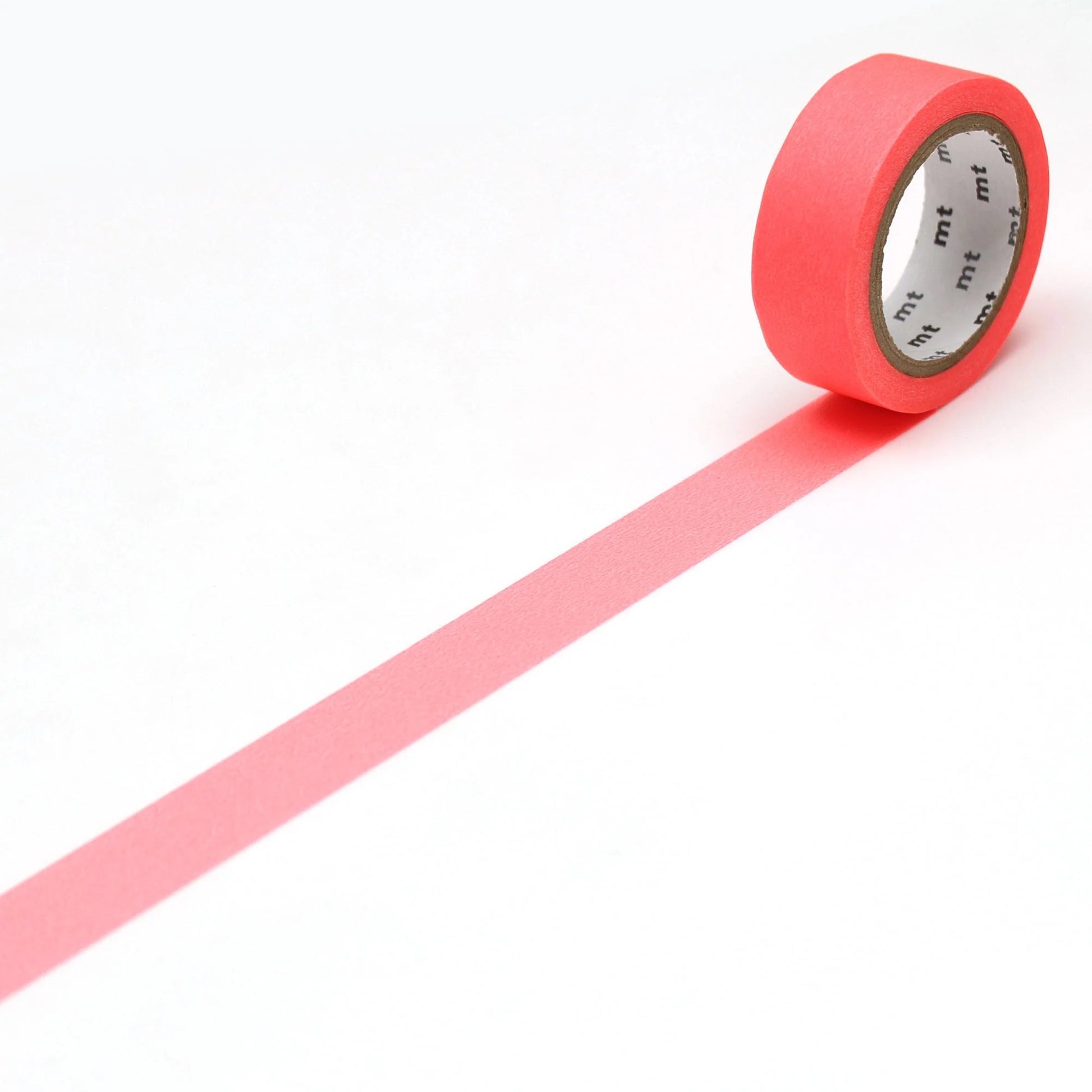 Roll of shocking red tape on a white background