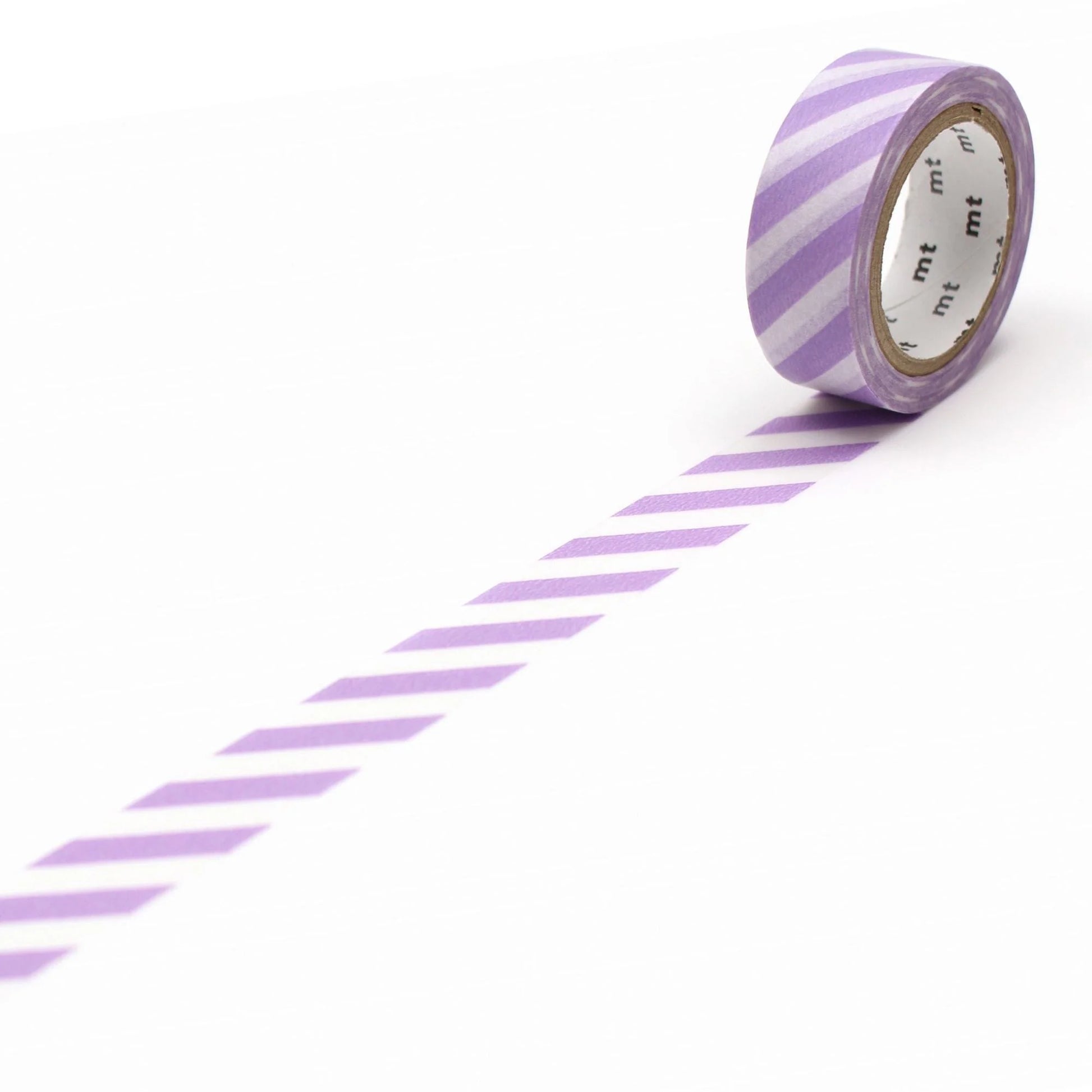 Roll of purple and white striped tape on a white background