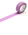 Roll of matte purple tape on a white background