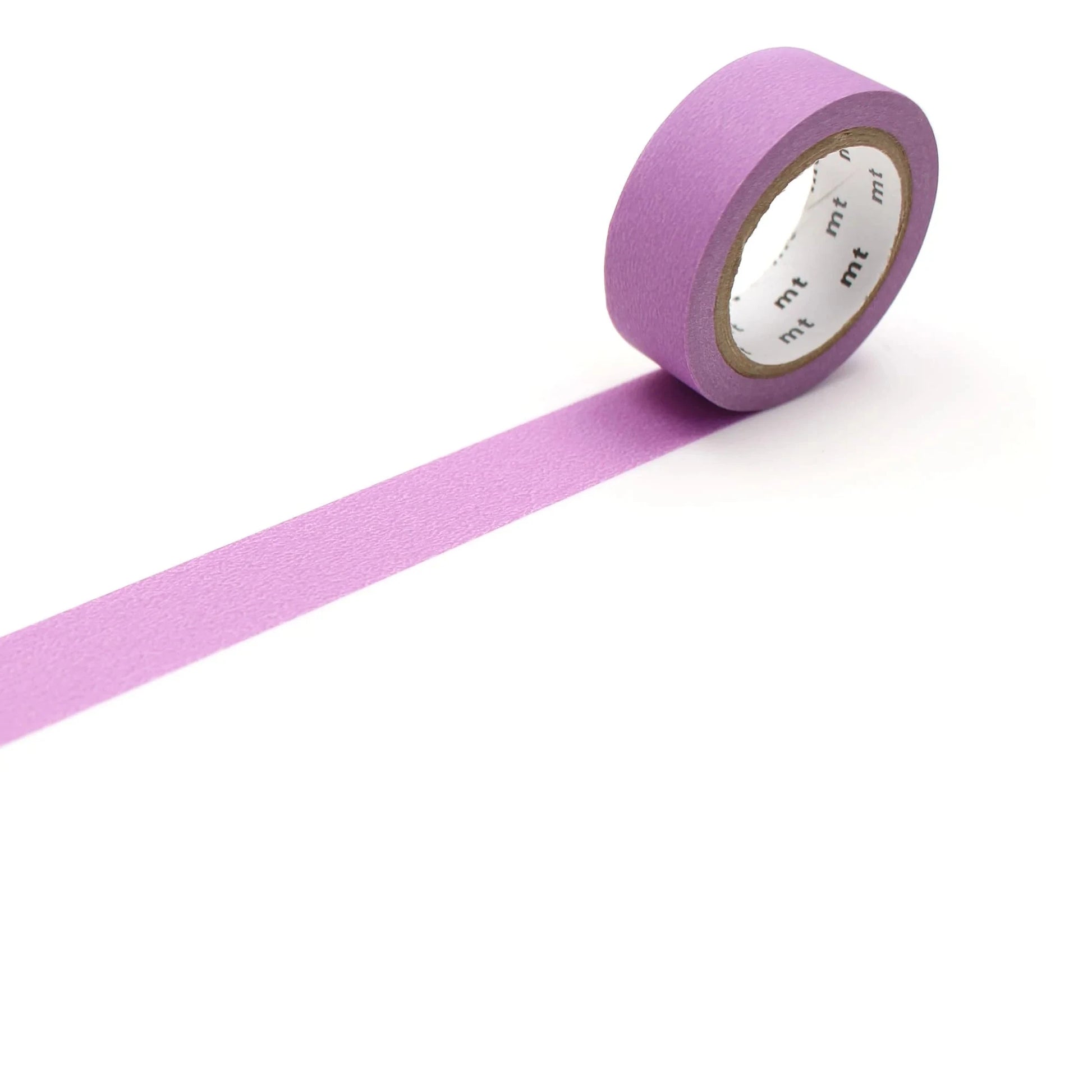 Roll of matte purple tape on a white background