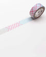 Roll of decorative tape with a pattern on a white background