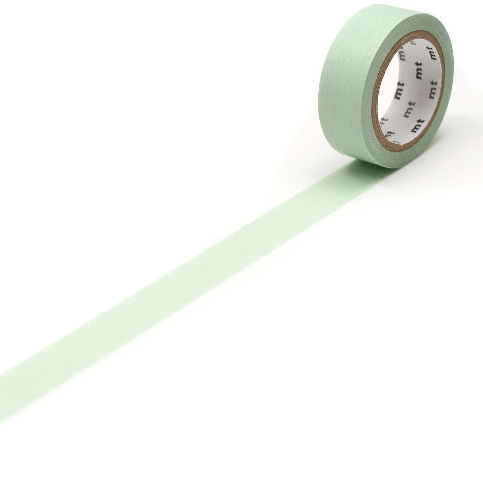 Roll of pastel ivy green tape with a white label on a white background