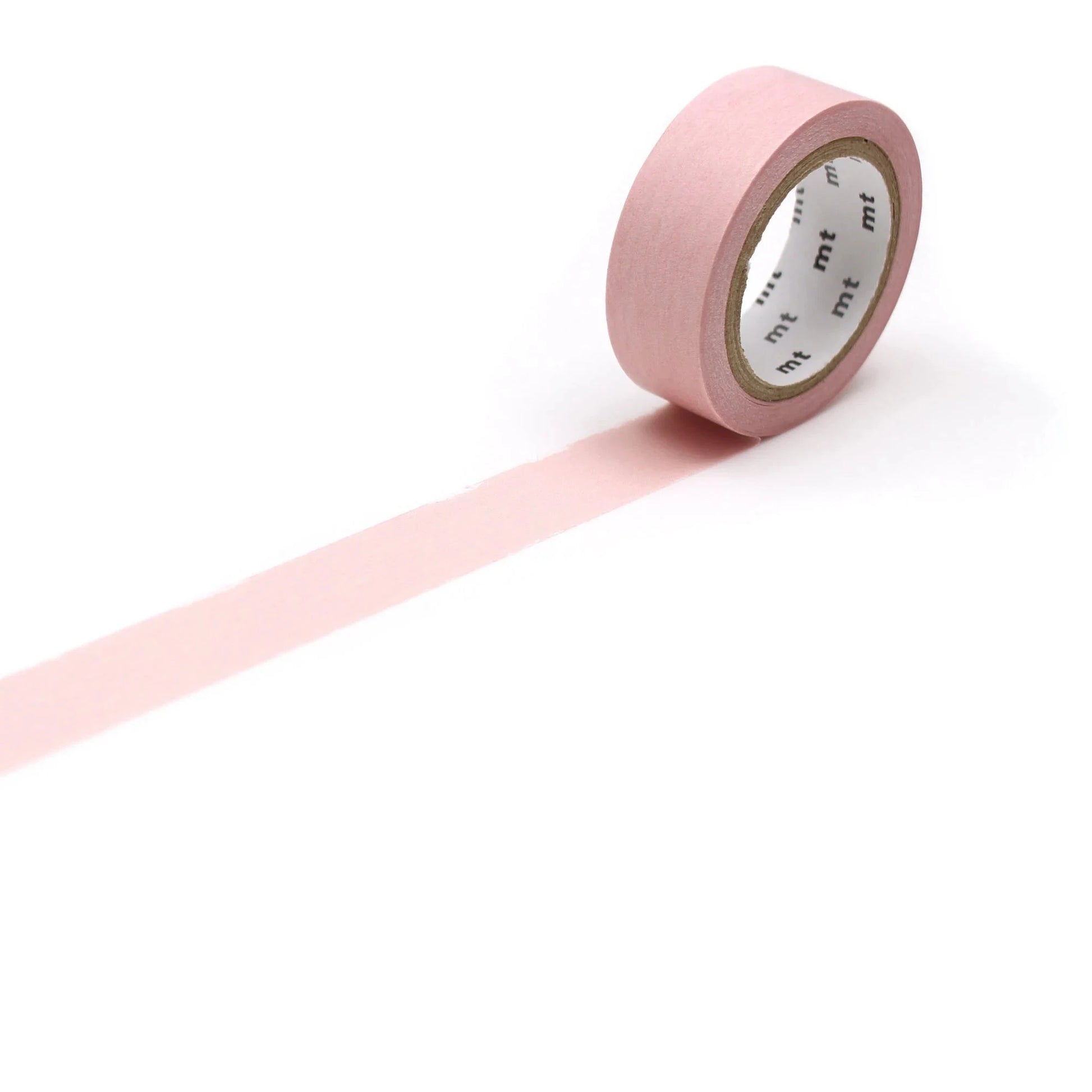 Roll of pink tape on a white background