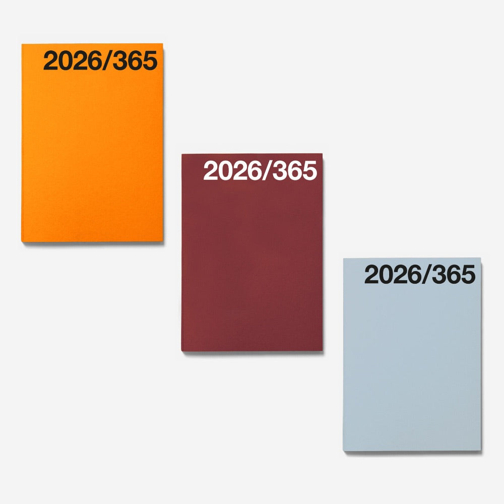 Three notebooks with '2026/365' text on orange, red, and blue covers against a white background.