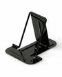 Black metal phone stand on a white background