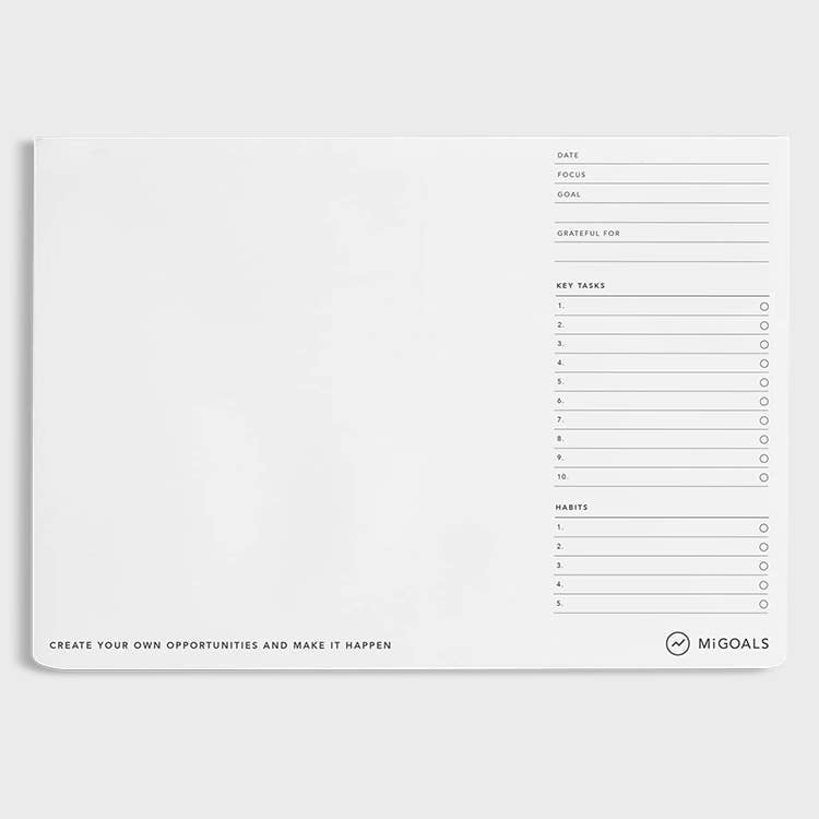 White planner pad with black text and checkboxes on a white background