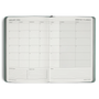 Open monthly planner with grid layout on white background