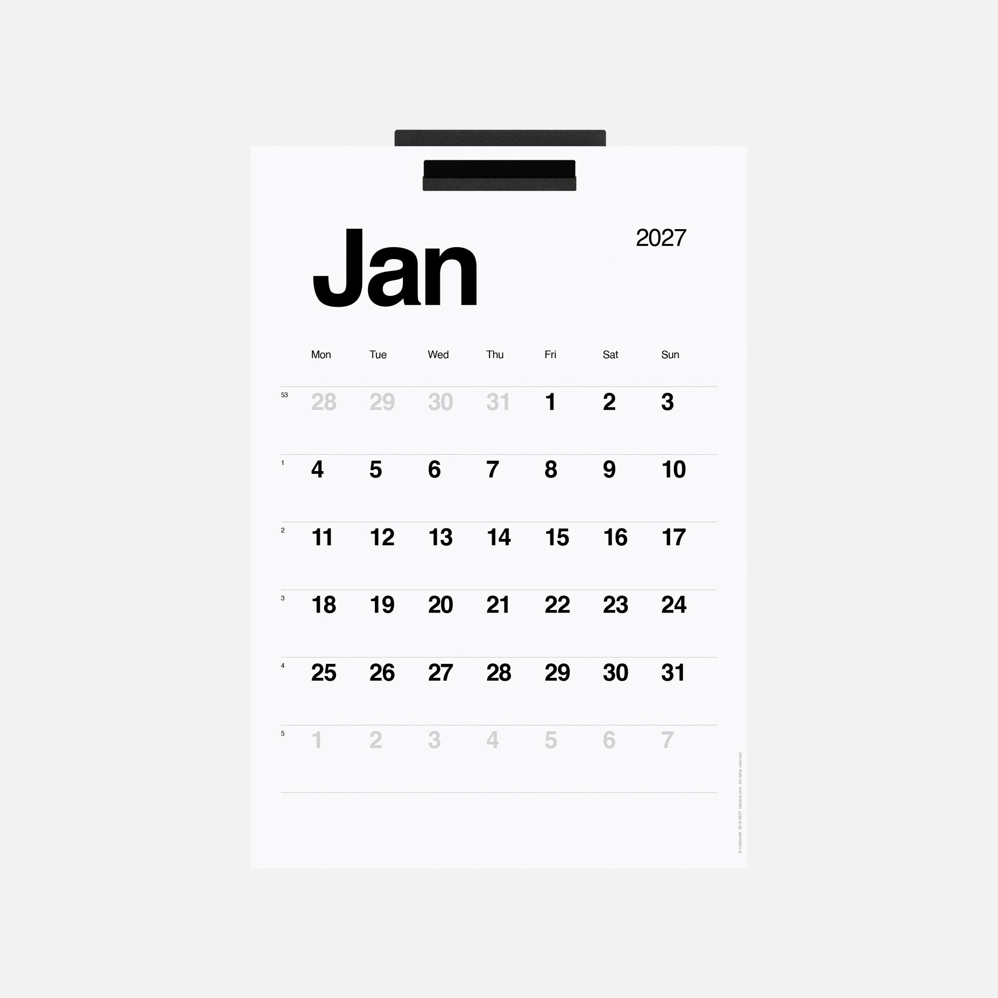 A minimalist January 2027 desk calendar page with black text on a white background, shown against a light gray backdrop.