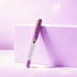 Purple pen with gold accents on a light purple background